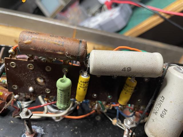 Goldentone 1776 vintage guitar amplifier circuit gut shot Goldentone 1776 vintage guitar amplifier circuit gut shot showing under the tag strip board